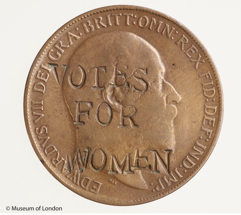 Vote-For-Women-Stamped-into-Coin-by-the-suffragettes-it-worked-Coin-design-reflecting-the-debate-over-how-women-are-represented-and-remembered-in-American-history.